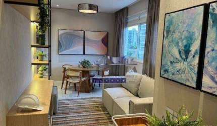 1 - DORMITÓRIO SUITE, COM 60,11 MTS2 ÚTIL  NA PONTA DA PRAIA - ENTREGA EM JULHO 2024  - ALTO PADRÃO -LAZER COM PISCINA