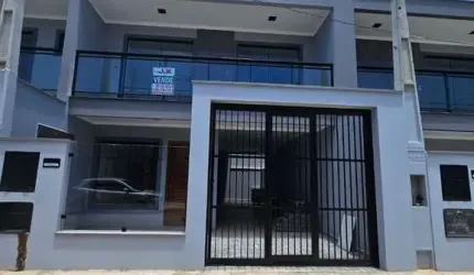Sobrado com 3 dormitórios à venda, 110 m² por R$ 549.900,00 - Itacolomi - Balneário Piçarras/SC