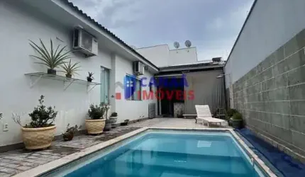 Casa  3 suítes c/ piscina aquecida área nobre Bairro Santa Mônica