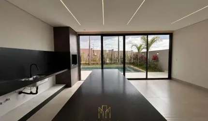 Casa de alto padrão no Condomínio Tamboré à venda em Uberlândia-MG: 4 quartos, 3 suítes, 2 salas, 4 banheiros, 4 vagas, 269,31 m².