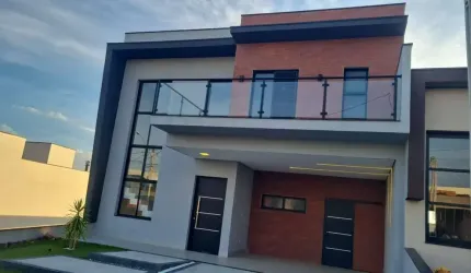 Sobrado com 3 suítes e piscina condomínio Evidencias