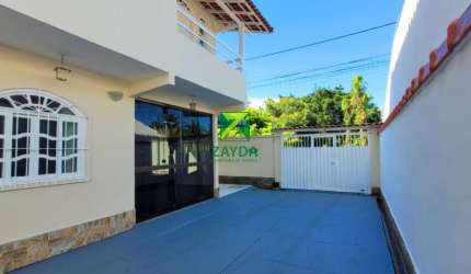 Casa à venda na Cidade Praiana, Rio das Ostras-RJ: 2 quartos, 1 suíte, 2 salas, 2 banheiros, 2 vagas de garagem, 97m² de área.