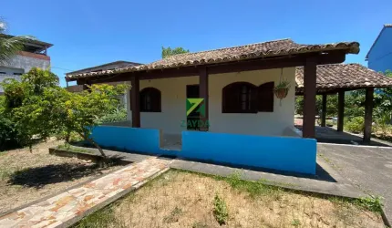 Casa à venda em Cabo Frio-RJ, bairro Tamoios: 2 quartos, 1 suíte, 2 salas, 2 banheiros. Quintal amplo com árvores frutíferas, casa na praia