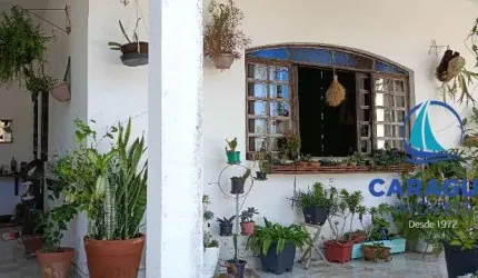 Sobrado com 4 dormitórios a venda .