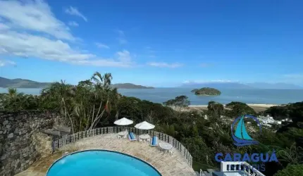 Casa com 4 quartos à venda na Praia da Cocanha, Caraguatatuba  por R$ 4.500.000