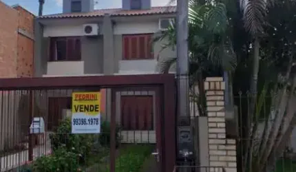 Casa com 2 quartos à venda no Hípica, Porto Alegre  por R$ 430.000