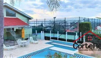 Casa em condomínio fechado à venda na Rua Padre João Batista Reus, 983, Vila Conceição, Porto Alegre por R$ 950.000