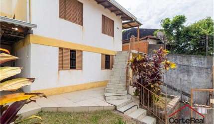 Casa com 5 quartos à venda na Rua Carlos Ribeiro da Silva, 199, Partenon, Porto Alegre por R$ 350.000