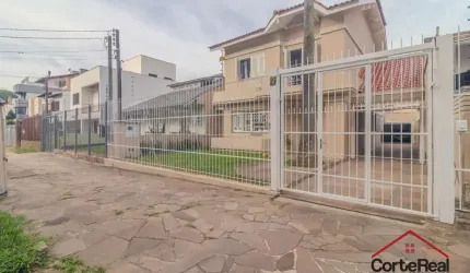 Casa com 3 quartos à venda na Rua Luzitana, 842, Higienópolis, Porto Alegre por R$ 1.100.000