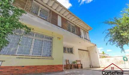 Casa com 5 quartos à venda na Rua João Bastian, 24, Três Figueiras, Porto Alegre por R$ 1.280.000