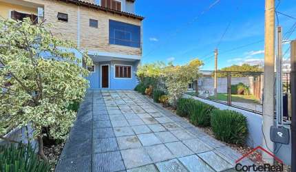 Casa com 3 quartos à venda na Rua dos Carijós, 324, Espírito Santo, Porto Alegre por R$ 699.000