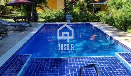 Área de 11000m² com 07 casas em Imbassai-Ba