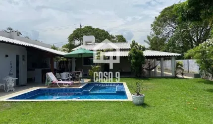 Casa a venda com terreno privativo em condomínio com acesso privativo ao mar em Itacimirim Bahia