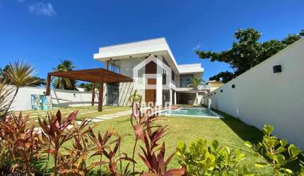 Casa com 07 suítes em Guarajuba-Ba