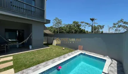 Casa com 3 dormitórios à venda, 100 m² por R$ 660.000,00 - Balneário dos Golfinhos - Caraguatatuba/SP