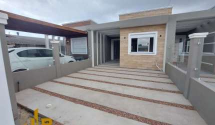 Casa 2 Dormitórios à venda no Bairro Zona Nova com 80 m² de área privativa - 2 vagas de garagem