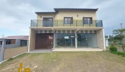 Casa 3 Dormitórios à venda no Bairro Nova Tramandaí com 180 m² de área privativa - 1 vaga de garagem