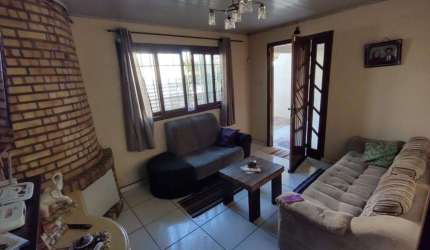 Casa 4 Dormitórios à venda no Bairro Centro com 110 m² de área privativa - 2 vagas de garagem