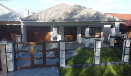 Casa 3 Dormitórios à venda no Bairro Nova Tramandaí com 93 m² de área privativa - 2 vagas de garagem