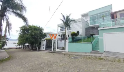 Casa com 4 quartos para alugar na Dr.  Agripa de Castro Faria, 102, Coqueiros, Florianópolis por R$ 6.990
