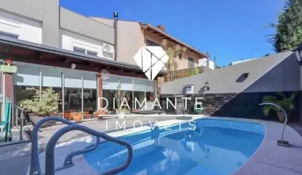 Casa em condomínio fechado com 3 quartos à venda na Avenida Edgar Pires de Castro, Hípica, Porto Alegre por R$ 1.149.000