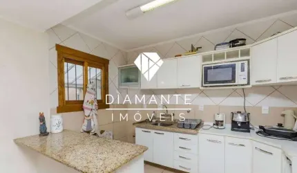 Casa com 3 quartos à venda na Rua Vacaria, Hípica, Porto Alegre por R$ 500.000