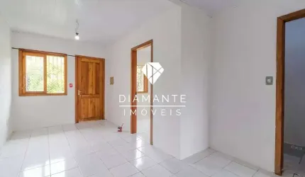 Casa com 2 quartos à venda na Rua do Schneider, Hípica, Porto Alegre por R$ 230.000