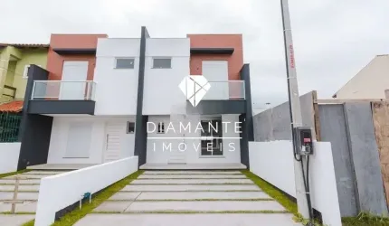 Casa com 3 quartos à venda na Rua Zuzu Angel, Hípica, Porto Alegre por R$ 460.000