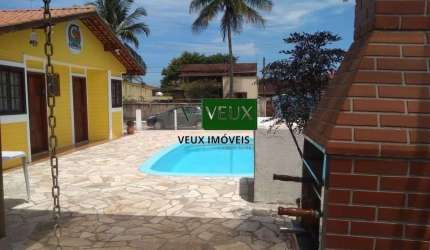 Casa com 4 quartos piscina e varanda gourmet em condomínio a venda Massaguaçu Caraguatatuba SP