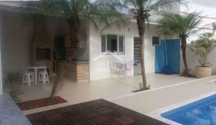 Sobrado para aluguel com 4 suítes, piscina e móveis planejados em Condominio