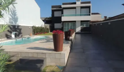Sobrado com 4 dormitórios à venda, 164 m² por R$ 1.690.000,00 - Balneário Praia Grande - Matinhos/PR