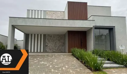 Casa à venda no condomínio Alphaville Esplanada 4 com uma bela piscina com borda infinita.
