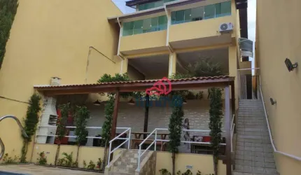 Sobrado com 4 dormitórios à venda, 600 m² por R$ 1.400.000,00 - Portão - Arujá/SP