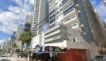 APARTAMENTO LATERAL EM PRÉDIO FRENTE MAR COM 1 SUÍTE E 2 DORMITÓRIOS PRONTO PARA MORAR.