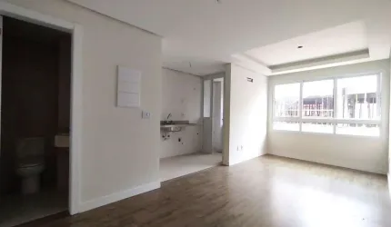 APARTAMENTO 1 DORMITÓRIO COM SUÍTE, COZINHA AMERICANA, LAVABO E AMPLO LIVING NO