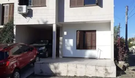 Casa quatro dormitórios ( 1 suíte) garagem ( 2 carros)