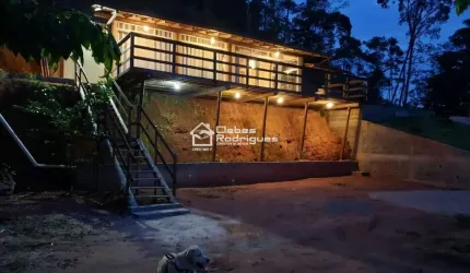 Terreno em Buenos Aires Guarapari , com casa nova com 172 M2 com bastante área verde.