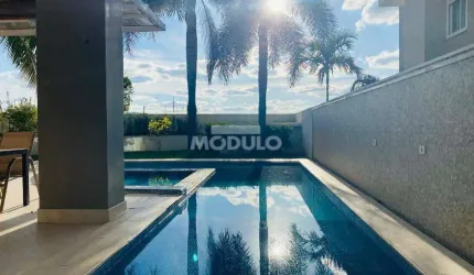 Sobrado de Condomínio ZONA SUL com 4 suites, espaço gourmet com piscina e por do sol