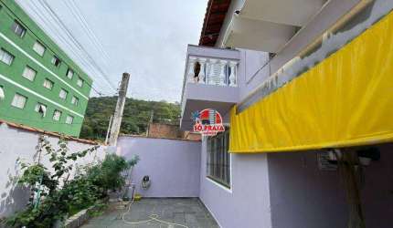 Sobrado com 3 dormitórios à venda, 120 m² por R$ 400.000 - Vila São Paulo - Mongaguá/SP