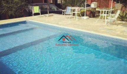 Casa com 4 dormitórios à venda, 228 m² por R$ 980.000,00 - Massaguaçu - Caraguatatuba/SP