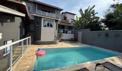 Casa com 5 dormitórios para alugar, 520 m² por R$ 5.500,00/mês - Massaguaçu - Caraguatatuba/SP