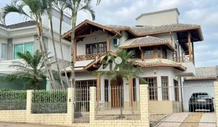Casa 4 Dormitórios com 2 Suítes