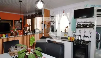 Casa com 4 dormitórios à venda, 157 m² por R$ 1.060.000,00 - Parque Novo Mundo -