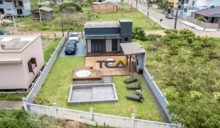 casa centro Passo de Torres, próximo a ponte de concreto.