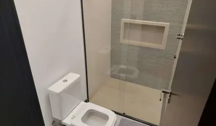 Casa com 4 suítes, 4 vagas de garagem, e 372 m² privativos em Ibiraquera - Imbituba/SC