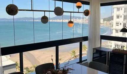 Apartamento alto padrão vista mar com 3 suítes e 2 vagas de garagem em Itapema