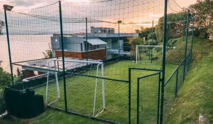 Mansão com 6 suítes e 6 vagas de garagem no bairro Cacupé em Florianópolis