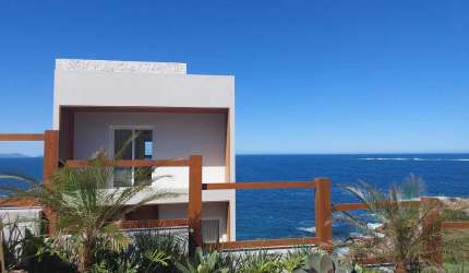 Casa com 3 suítes, 2 vagas de garagem, 200 m² privativos na Praia da Vigia - Garopaba/SC