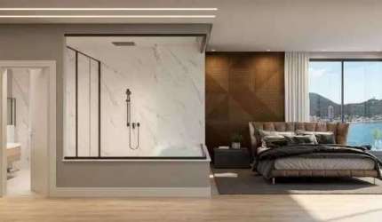 Apartamento frente-mar com 229,31m² privativos, 4 suítes e 3 vagas no Centro de Itapema