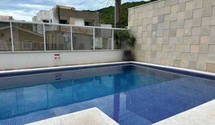 Apartamento mobiliado com 2 suítes e 2 vagas de garagem no bairro Ressacada